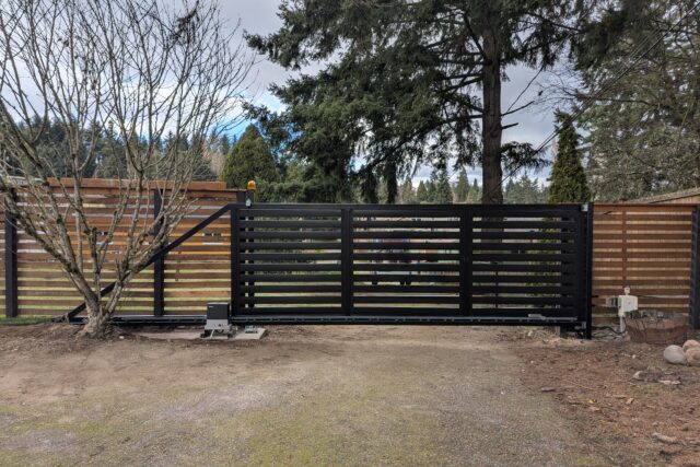 Automatic Cantilever Gate in TERRA Style, Wireless Keypad, and Outdoor Lighting.