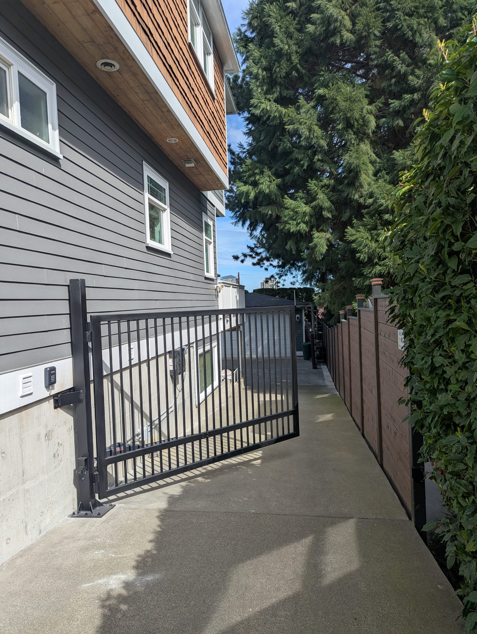Automatic Single Swing Gate Installation in Seattle, WA | IRON Style